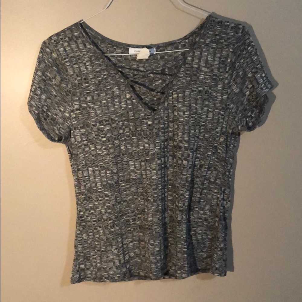 Black and white vneck top with crisscross work